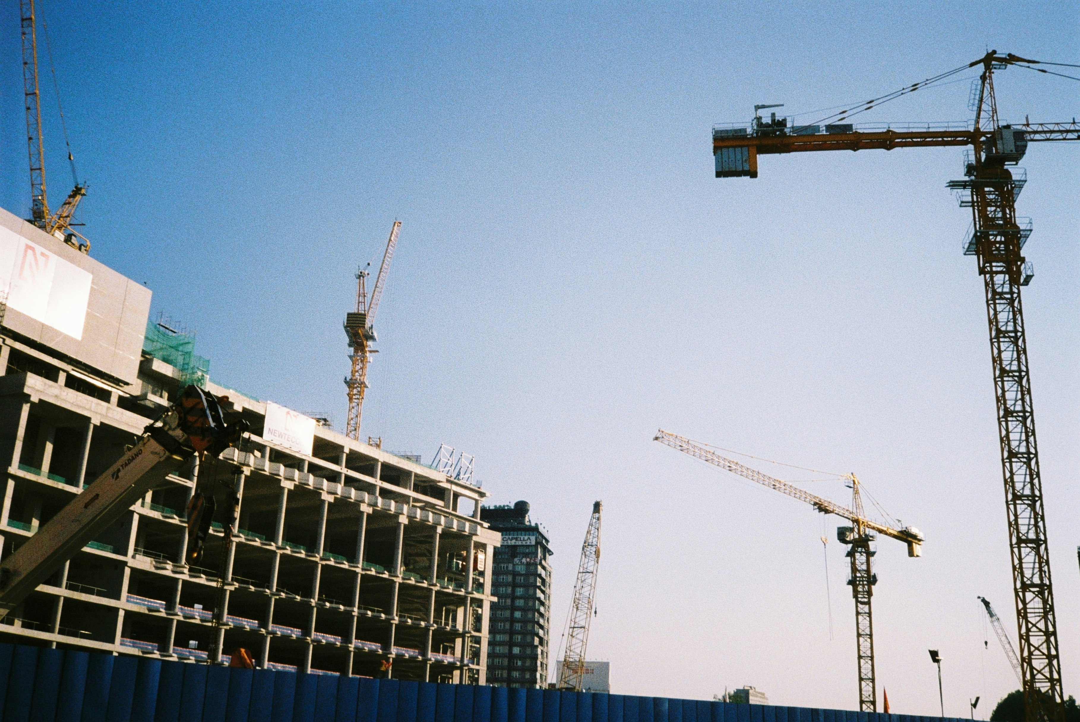 white and blue building under blue sky during daytime